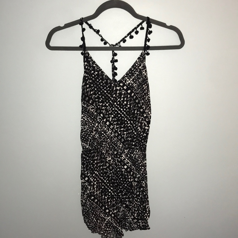 Romper with pom pom straps